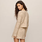 Z Supply Cressa Cardigan in Natural shown on model on plain background.