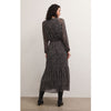 Brunette model wearing Z Supply Della Floral Midi Dress in Black with black boots in front of a white background