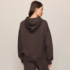 Z Supply First Quarter Hoodie in Cocoa Bean shown on model on plain background.