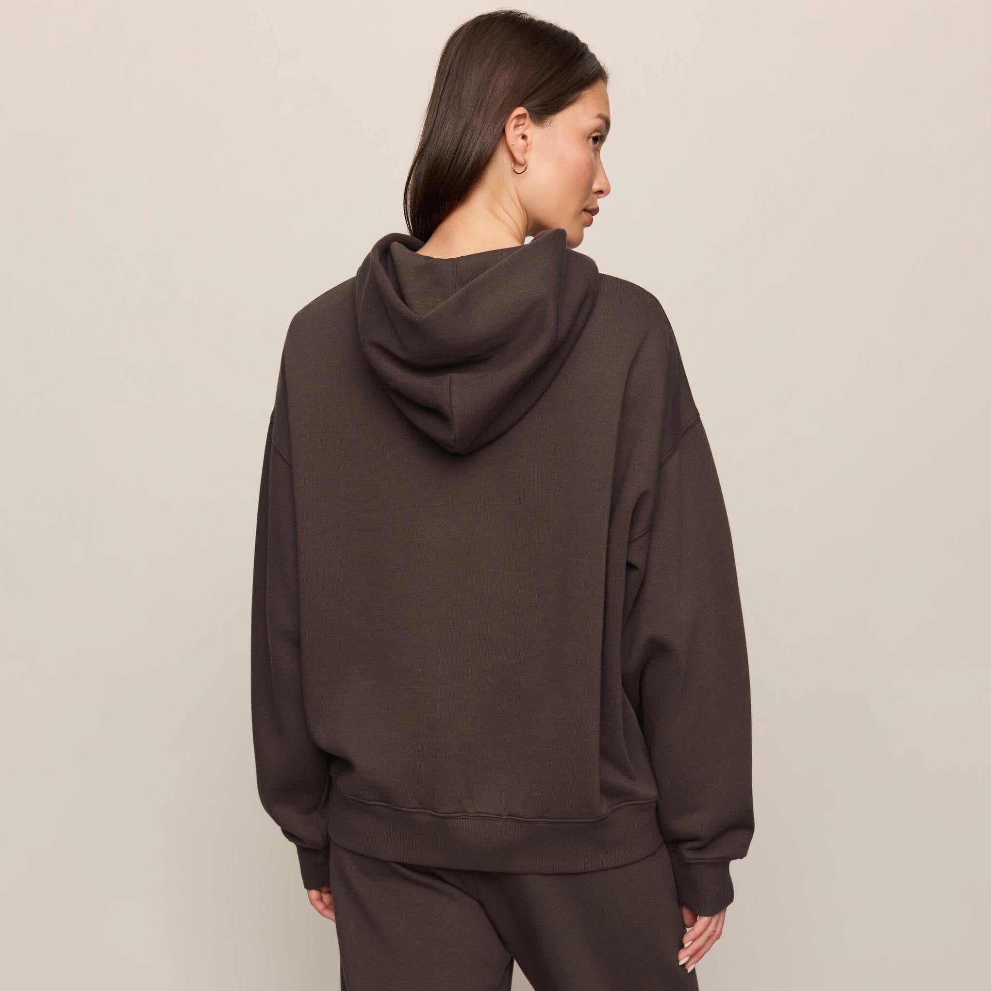 Z Supply First Quarter Hoodie in Cocoa Bean shown on model on plain background.