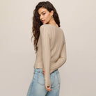 Z Supply Landa Sweater Top in Natural shown on model on plain background.