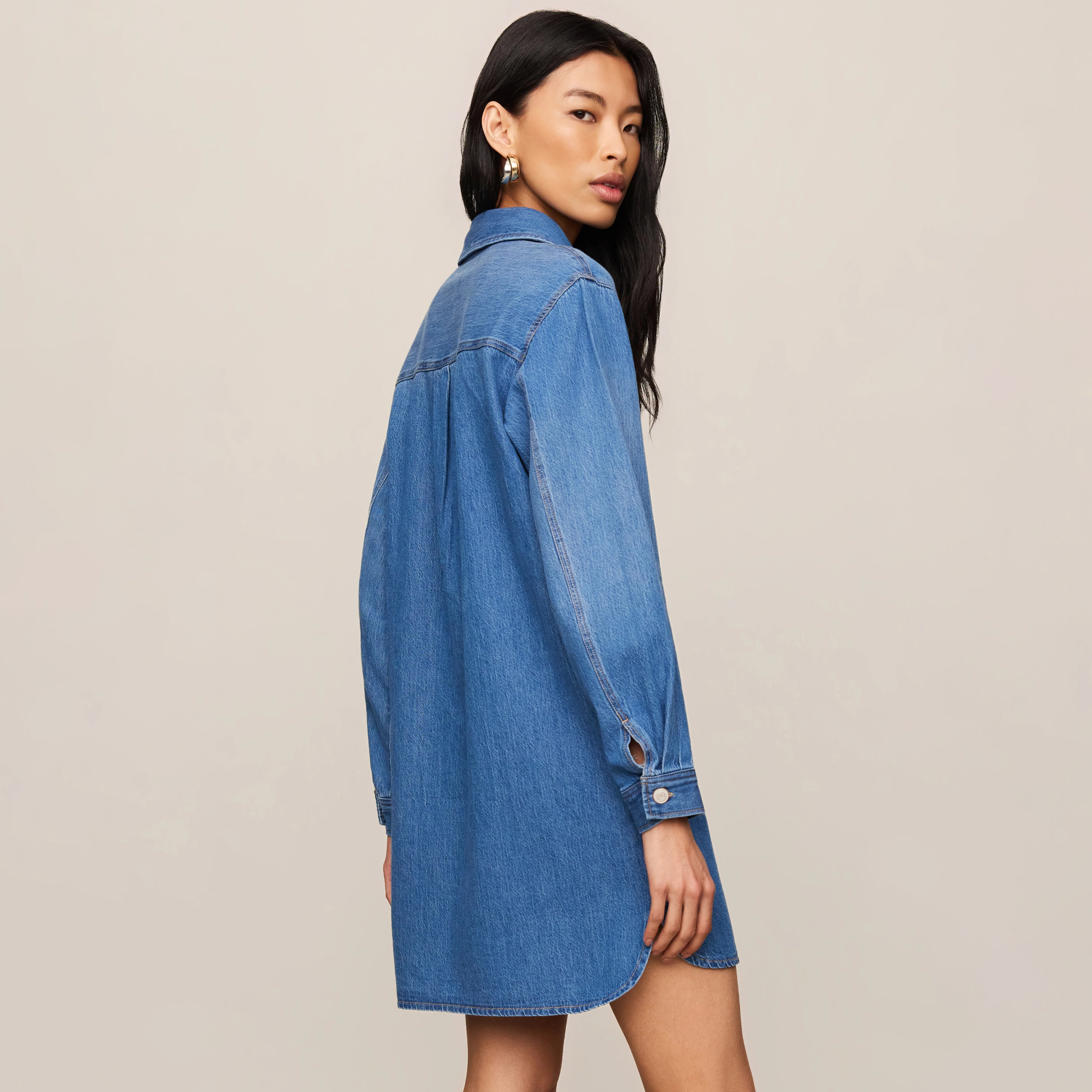 Z Supply Lucie Denim Shirt Dress in Dreamstate shown on model on plain background.