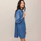 Z Supply Lucie Denim Shirt Dress in Dreamstate shown on model on plain background.