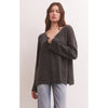 Z Supply Modern Sweater in Heather on model with wide leg blue jeans in front of a white wall