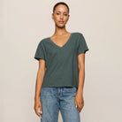 Z Supply Nomad V-Neck Tee in Emerald Cove shown on model on plain background.