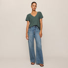 Z Supply Nomad V-Neck Tee in Emerald Cove shown on model on plain background.
