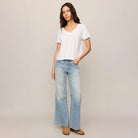 Z Supply Nomad V-Neck Tee in White shown on model on plain background.