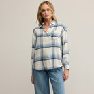 Z Supply River Plaid Button Up in Vintage Indigo on a beige background at Addison West
