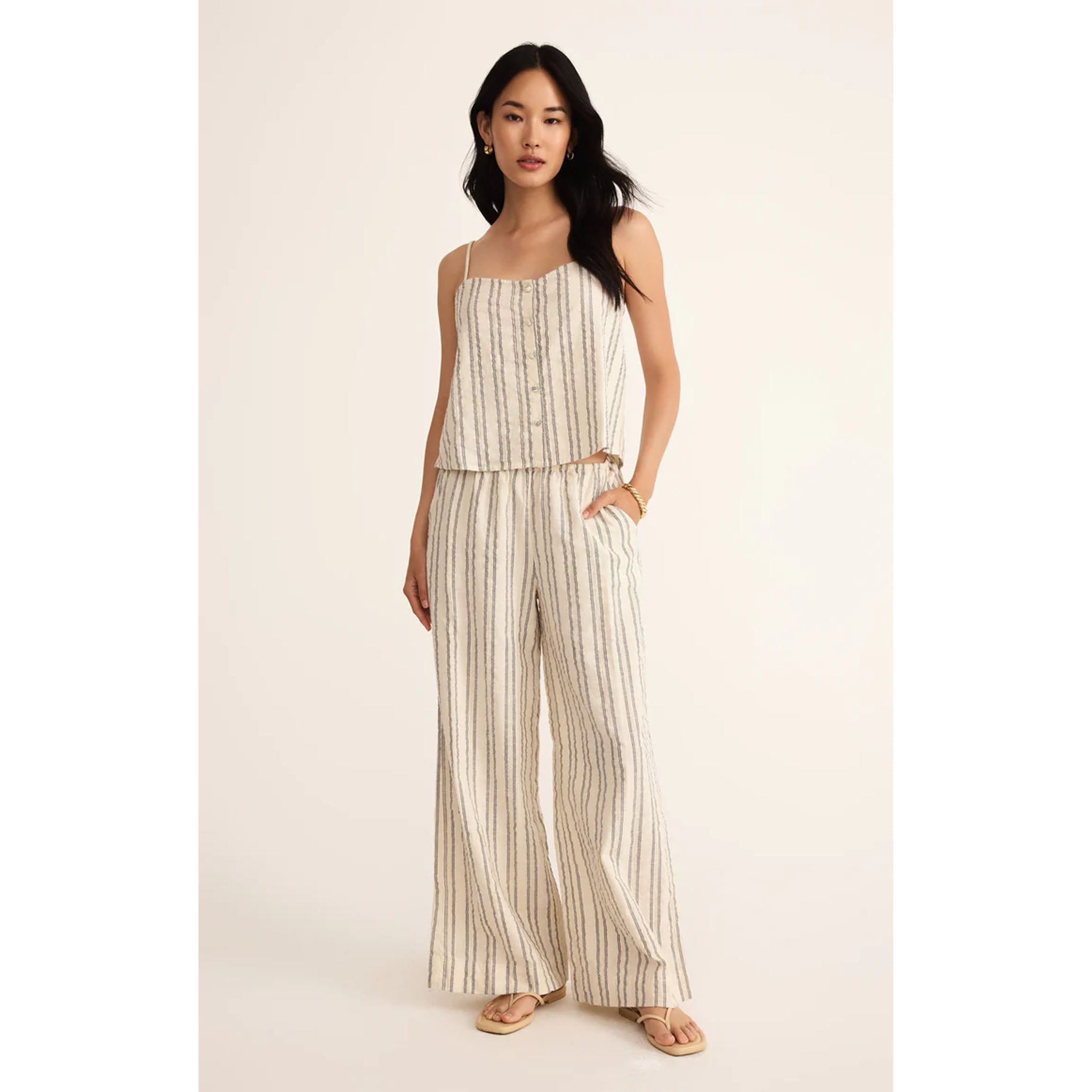 Model wearing Z Supply Soleil Stripe Pant in Sea Salt with mathcing tank top 