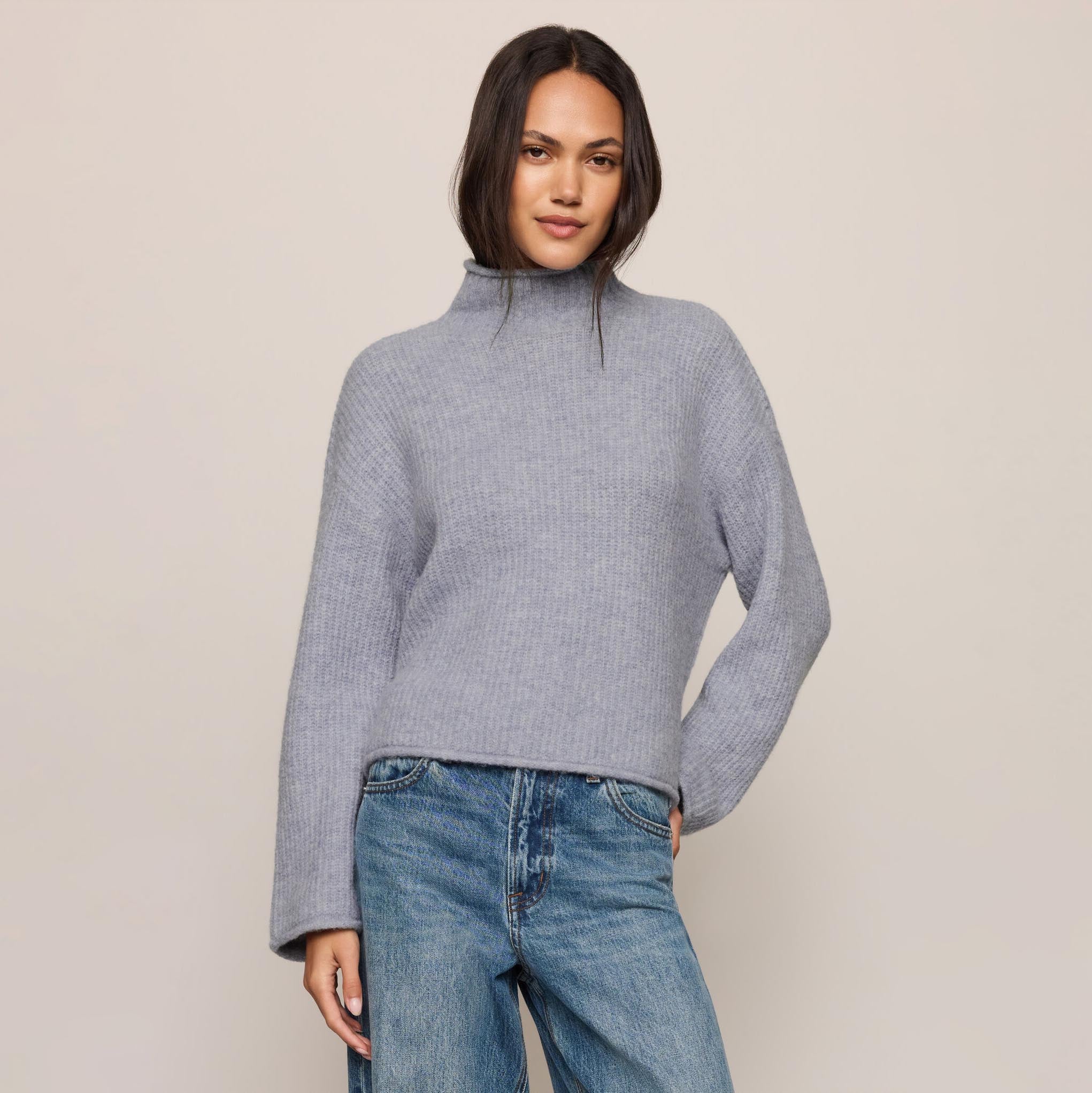 Z Supply Warm Wishes Sweater in Silverlake shown on model on plain background.