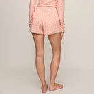 Z Supply Better Off Ditsy Shorts in Rosewater shown on model on plain background.