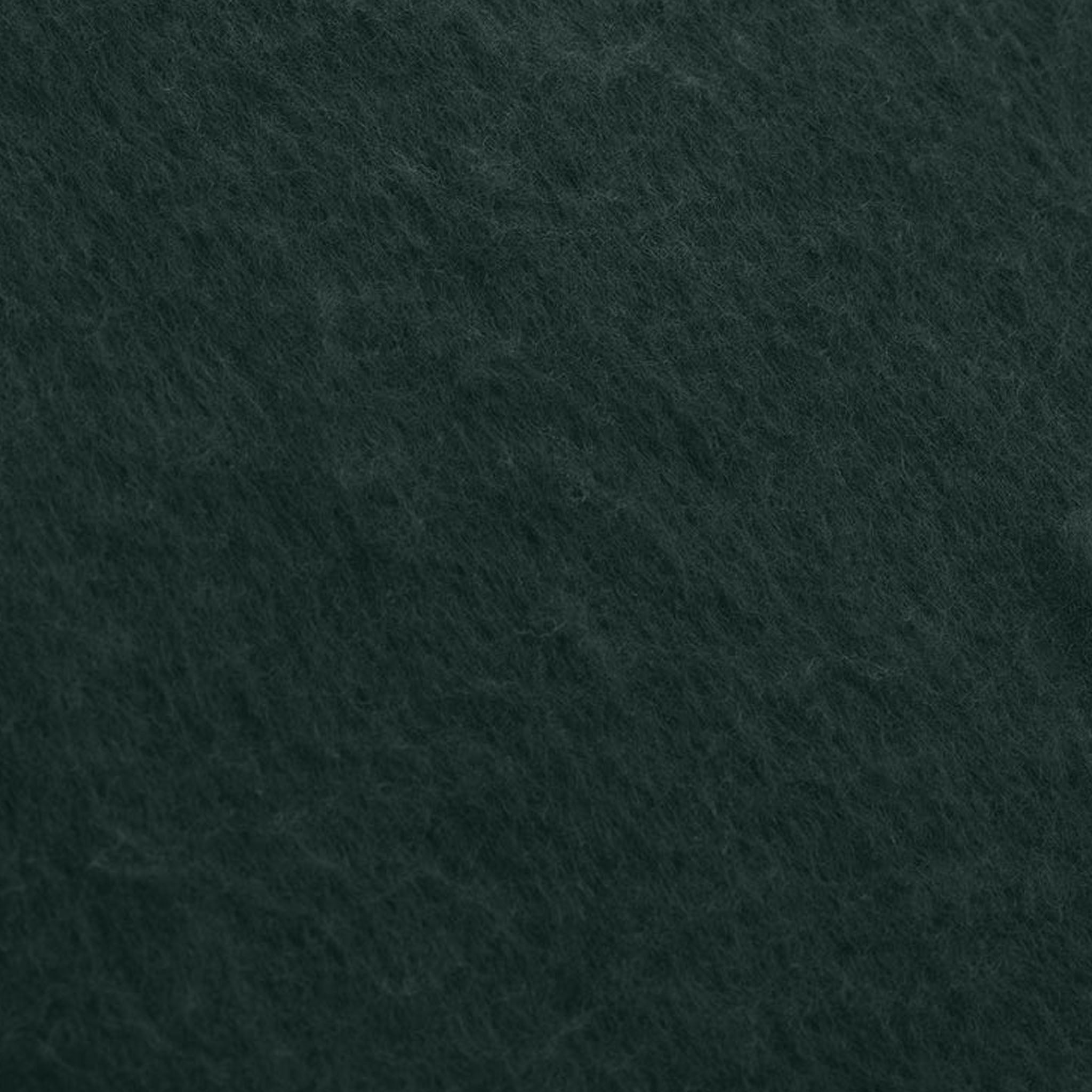 Close up look at green colored fabric.