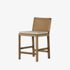 Four Hands Zuma counter stool with beige cushion and woven back in Dune Ash on a white background