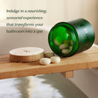 Daily Pebble | Deep Moisturizing Solid Bath & Shower Oil in a bathroom at Addison West