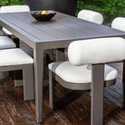 Close up of Porter Indoor–Outdoor Dining Table on a patio at Addison West