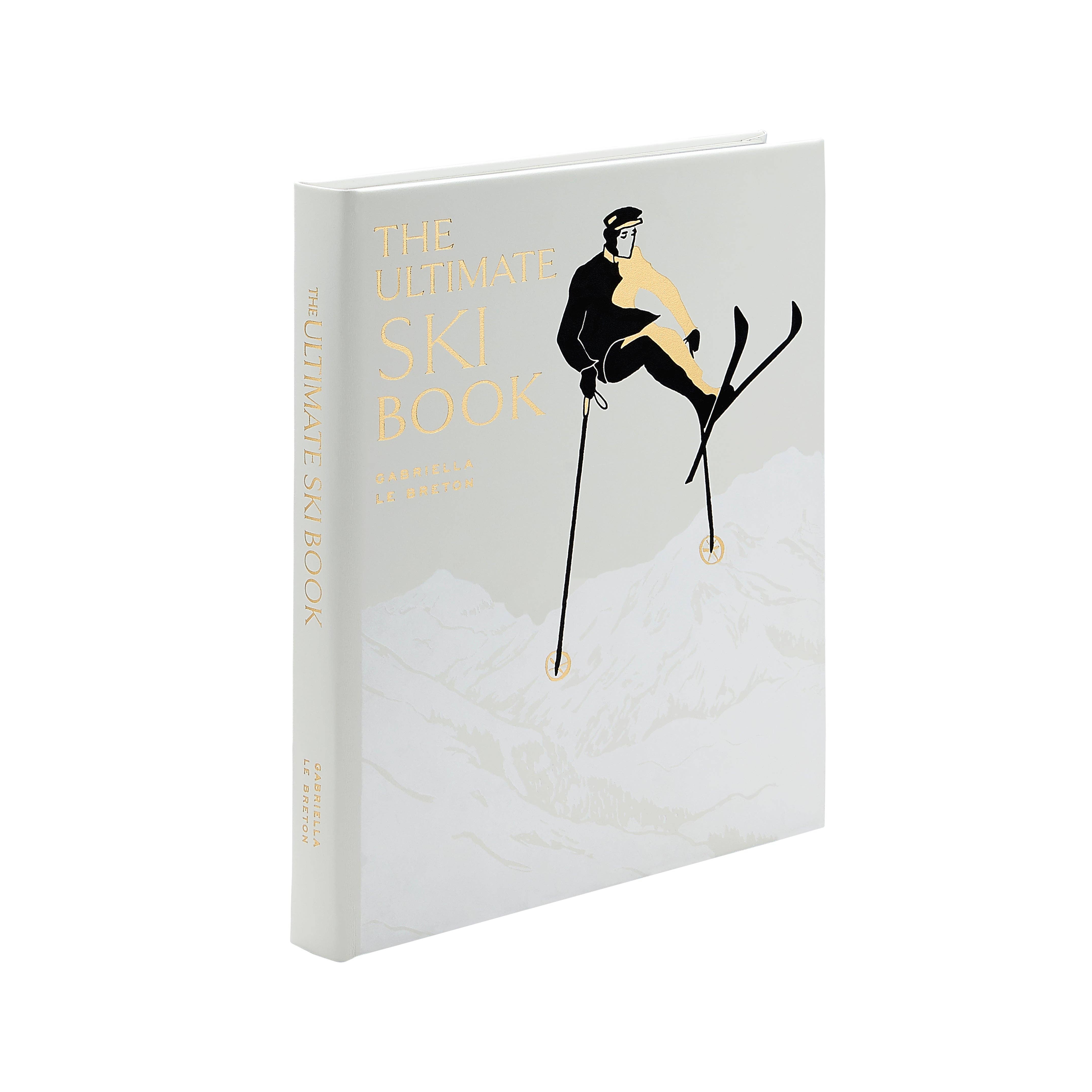 Book titled 'The Ultimate Ski Book' in leather by graphic image with a cover illustration of a skier on a white background