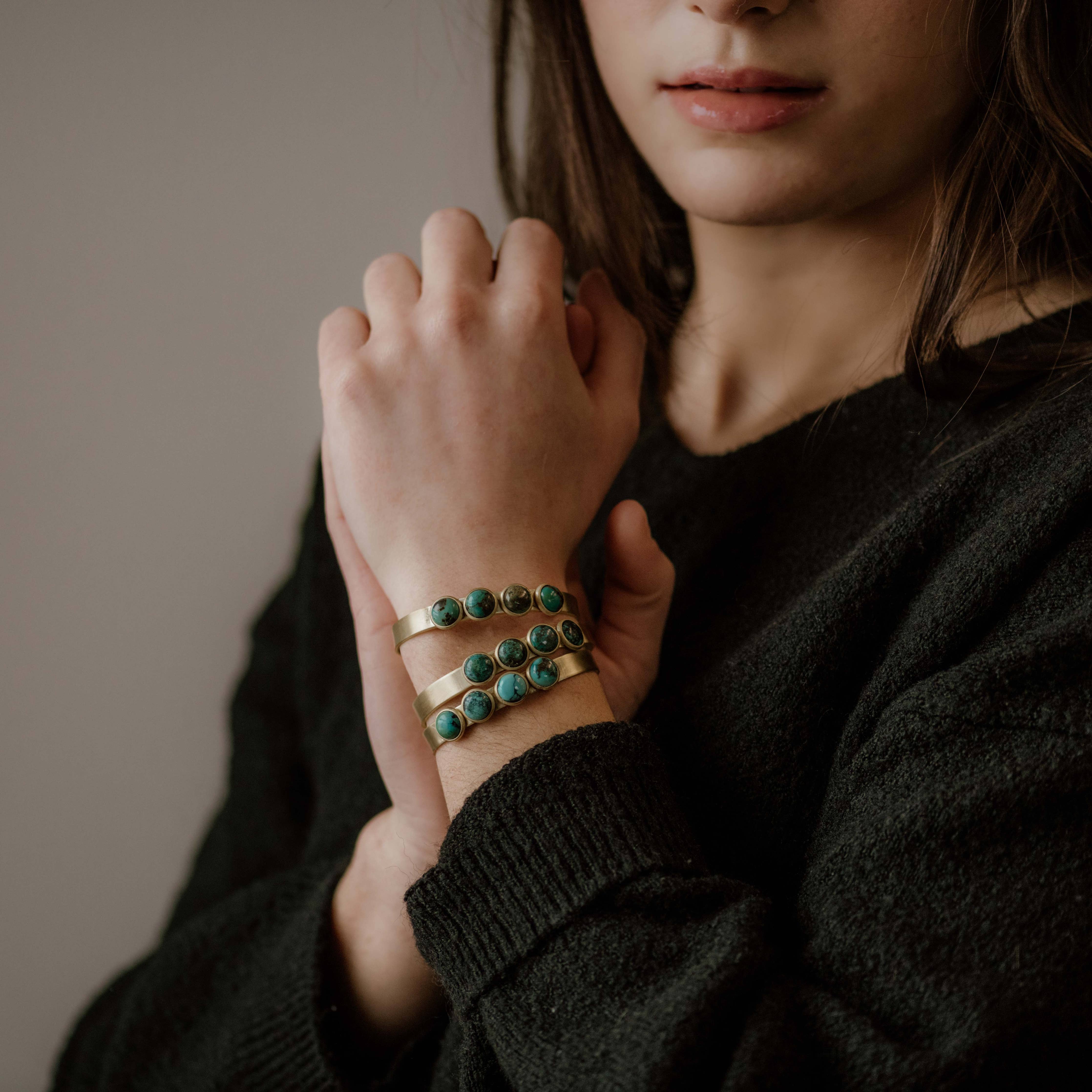 Commonform Bridger Cuff in Turquoise on model at the Addison West.
