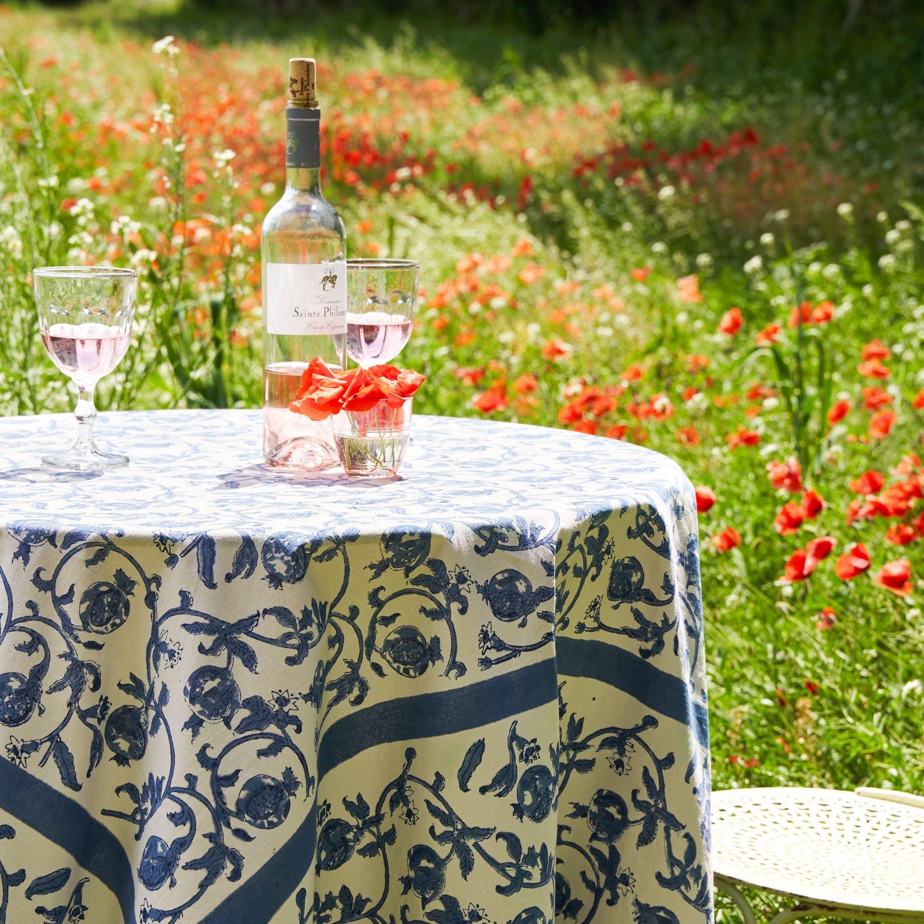 Granada Cornflower Tablecloth 59" x 59" on a table at Addison West