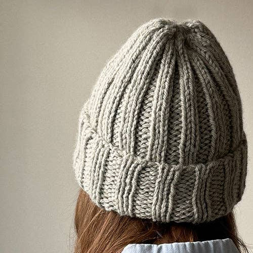 Knitting Craft Kit: Shoreline Beanie in Pebbled Beach on a beige background at Addison West