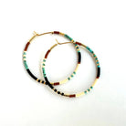 Ocean Breakup Large Beaded Hoop Earrings in Desert on white background at the Addison West.