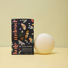 Kate McLeod Dusk Stone Natural Insect Repellant on a yellow background