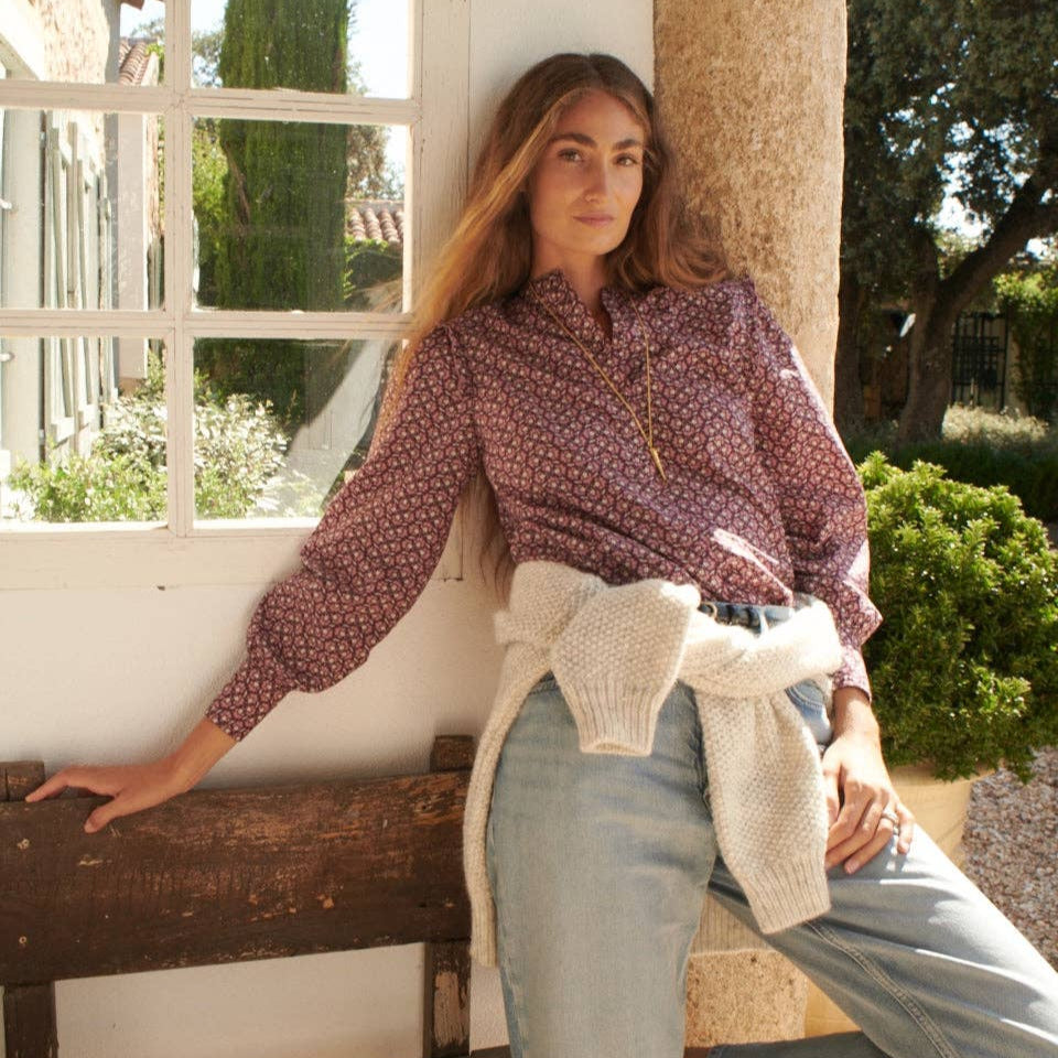 Chloe Blouse in Wine on a white wall at Addison West