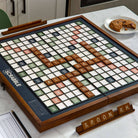Scrabble Grand Folding Edition on a table  at Addison West