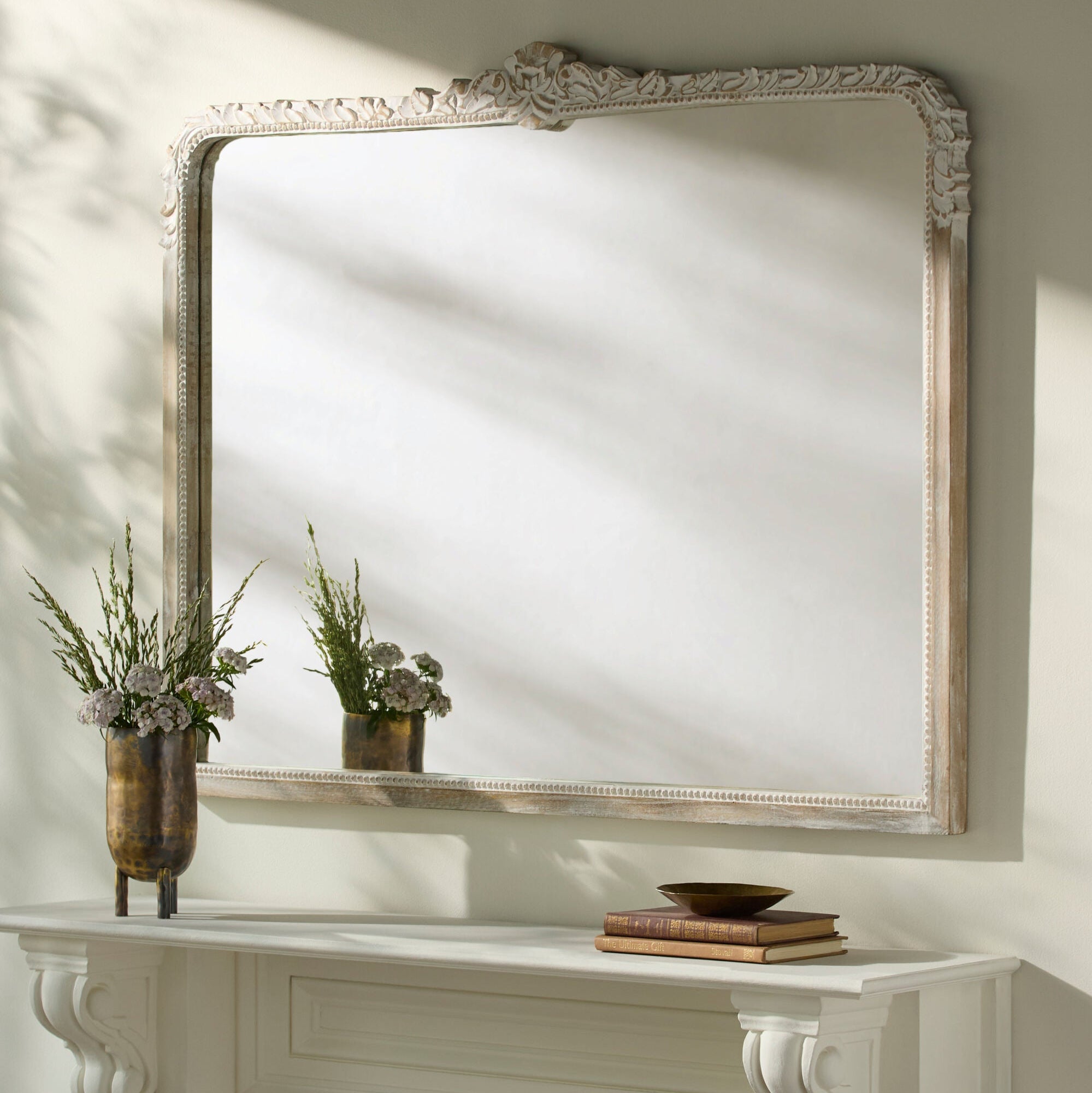 Aaliyah Mantel Mirror on a white wall at Addison West