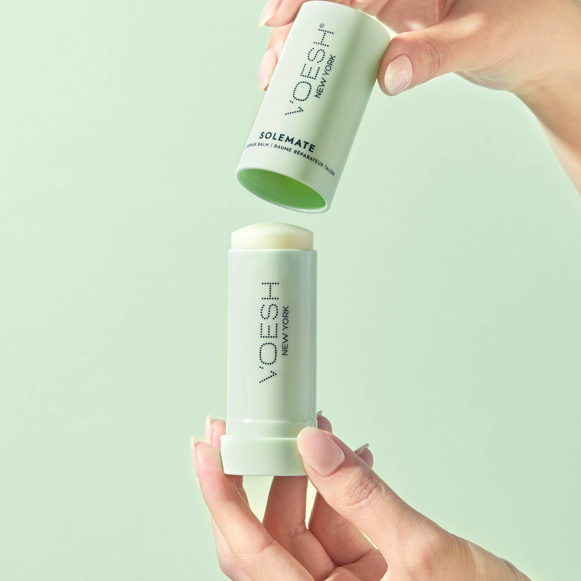 Solemate Heel Repair Balm in Mint on a green background at Addison West