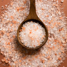 Afterglow Bath Salts in an orange background at Addison West