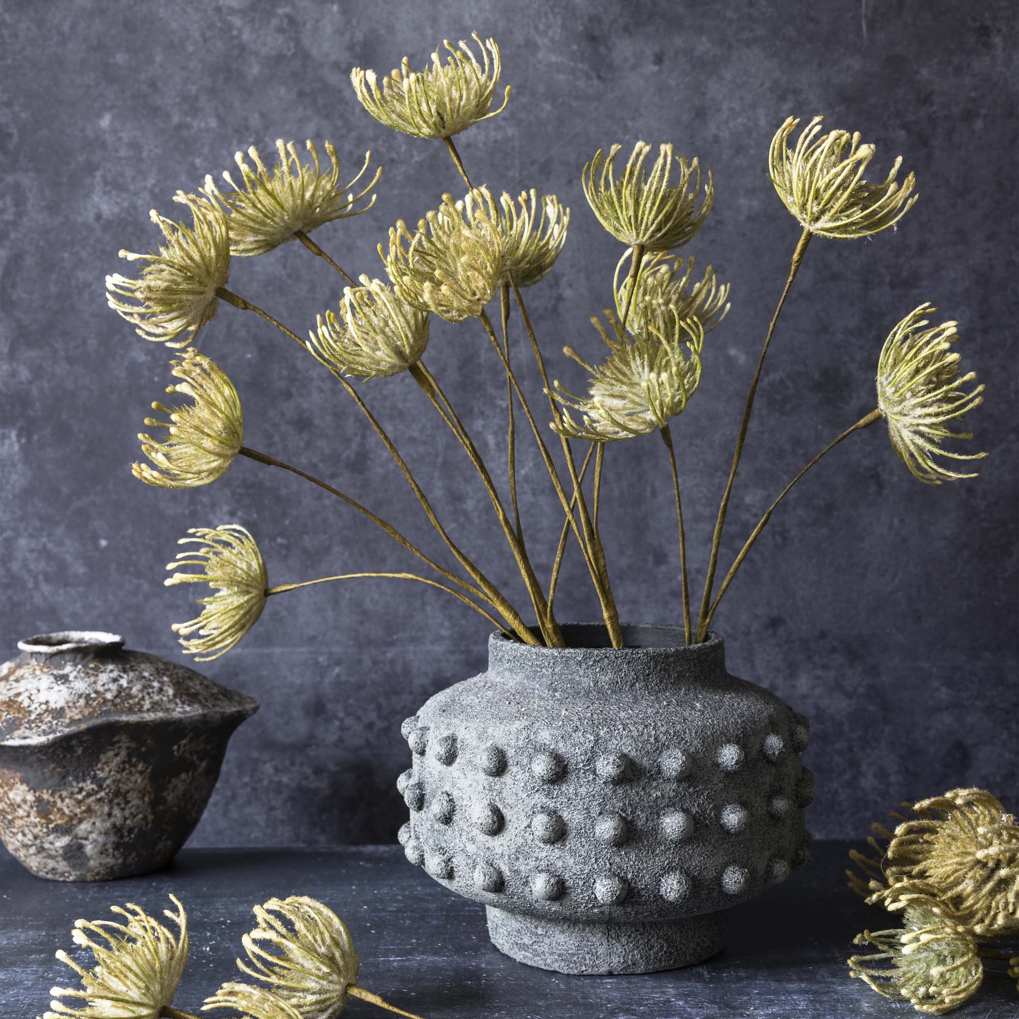 Abigail Ahern Artificial Leucospermum in Green in a concrete vase