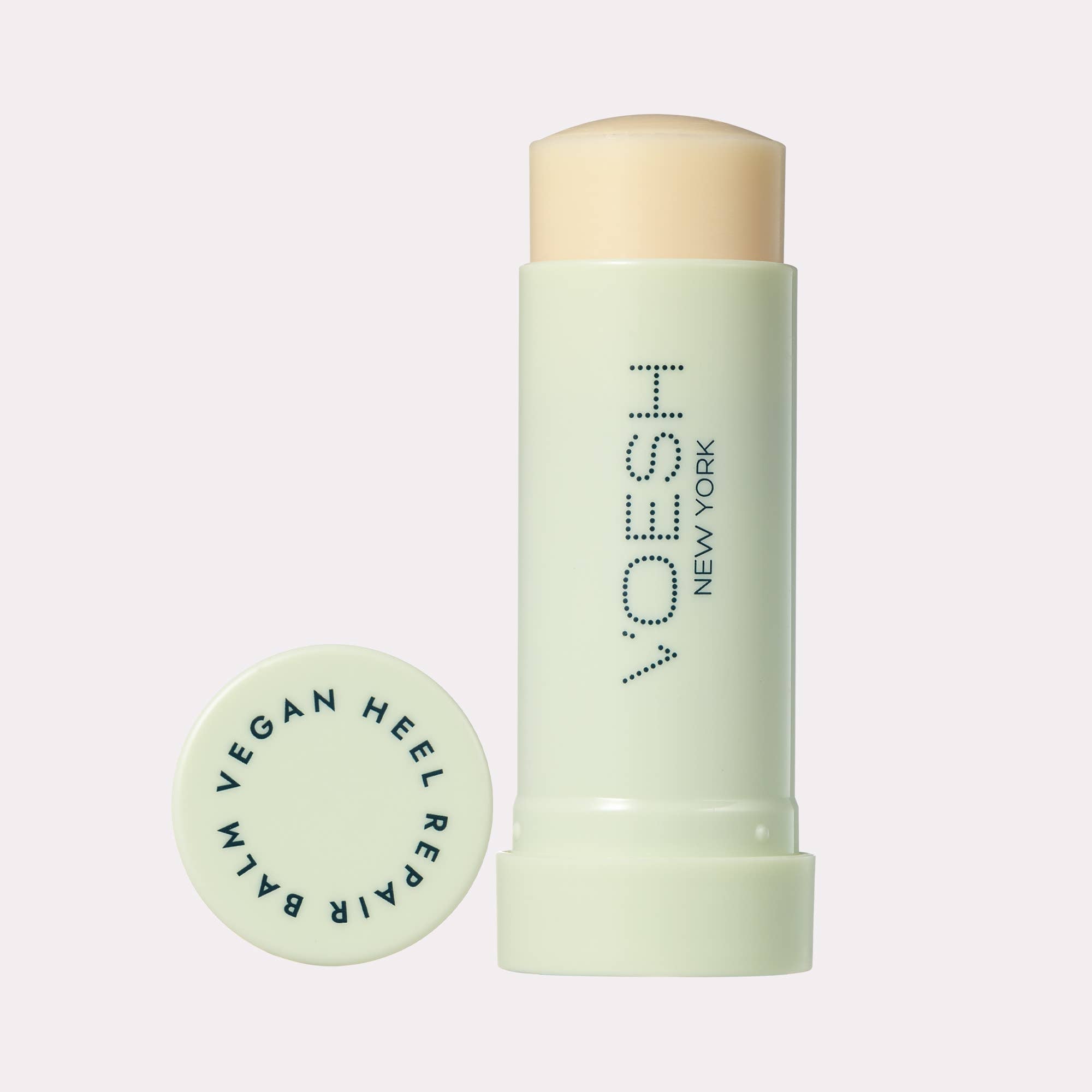 Solemate Heel Repair Balm in Mint on a pink background at Addison West