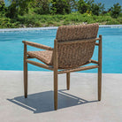 Sutter Outdoor Dining Chair on a patio at Addison West