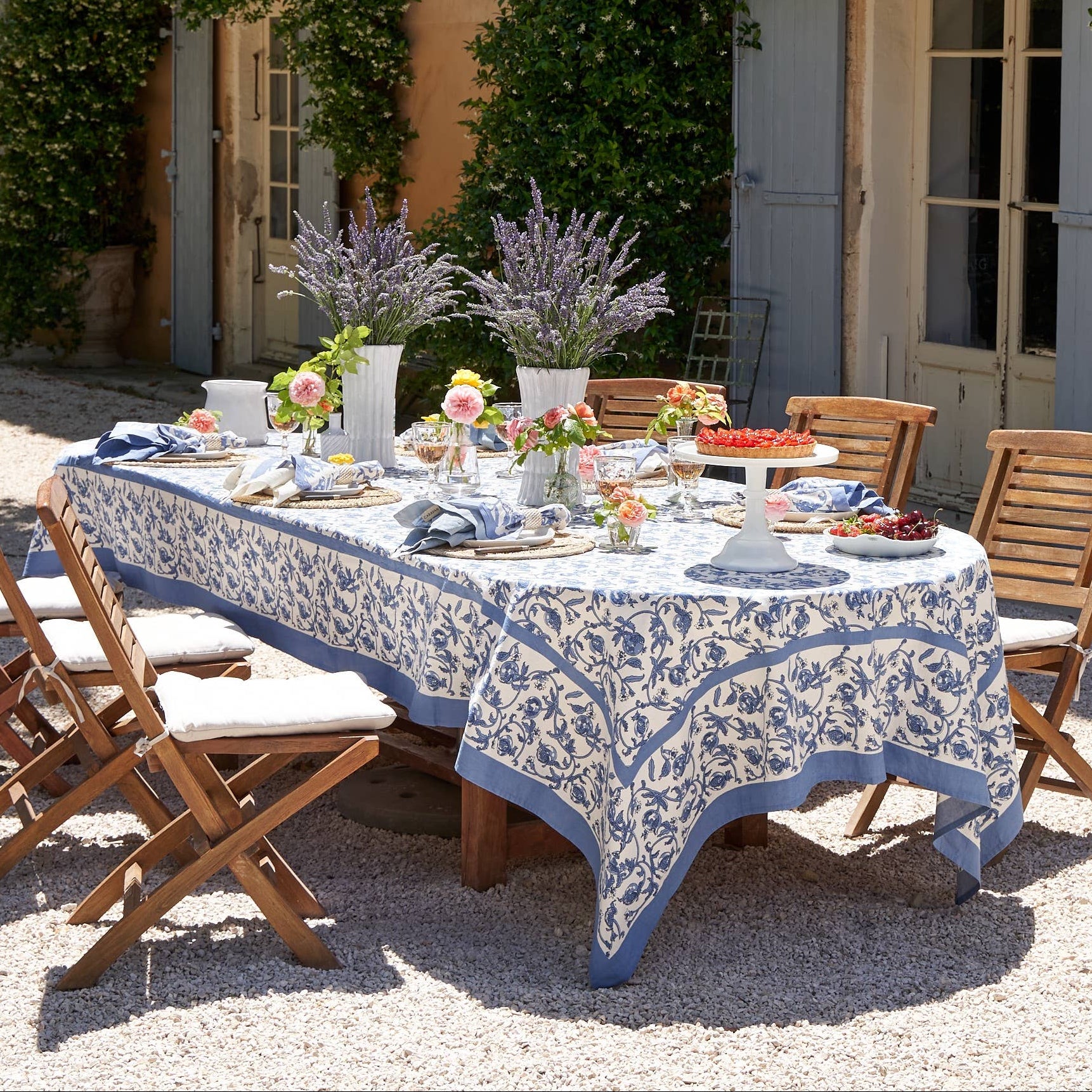 Granada Cornflower Tablecloth 71" x 128" on a table at Addison West