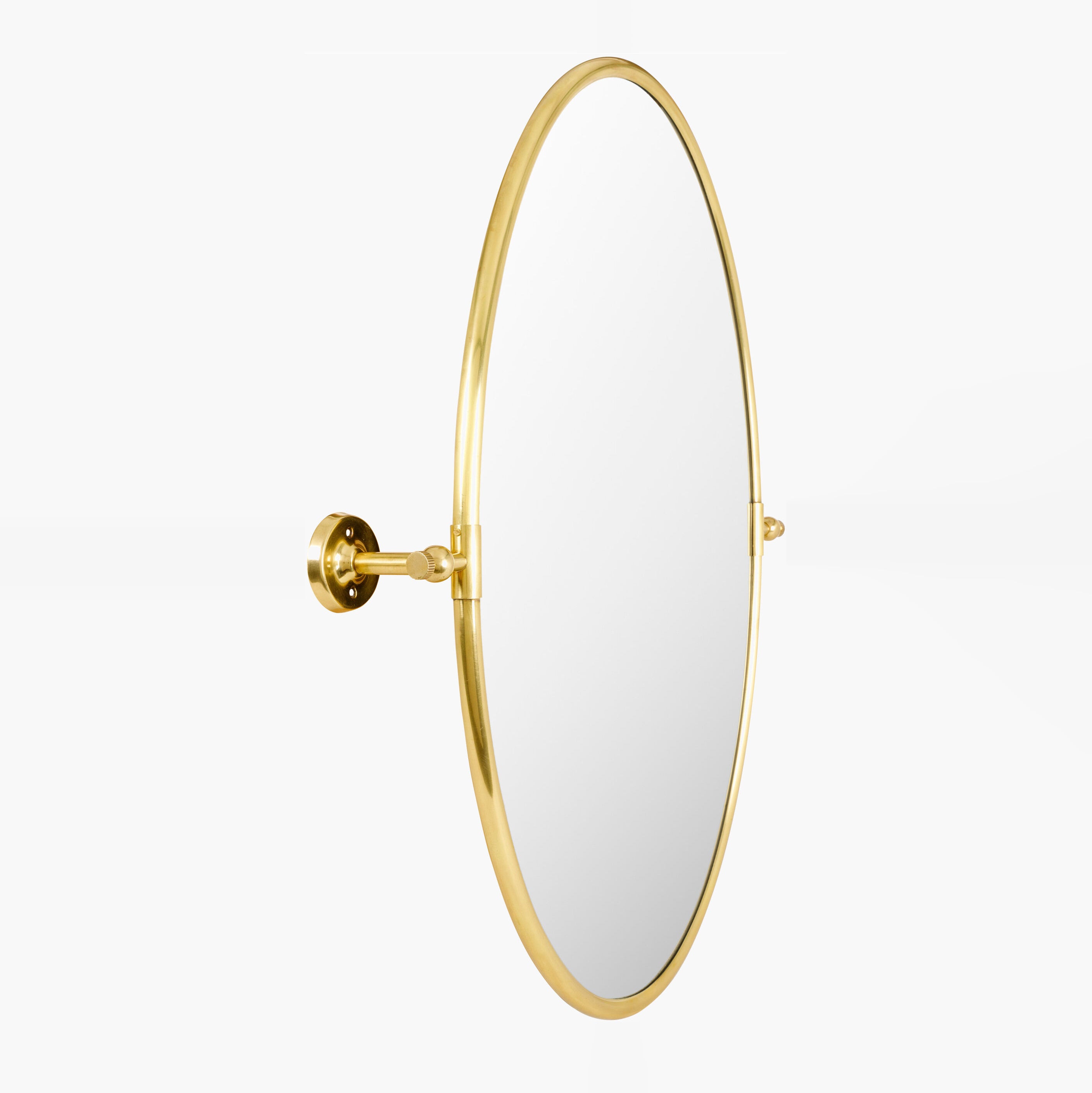 Oval Burnish Accent Mirror in Antiqued Gold on a white background at Addison West