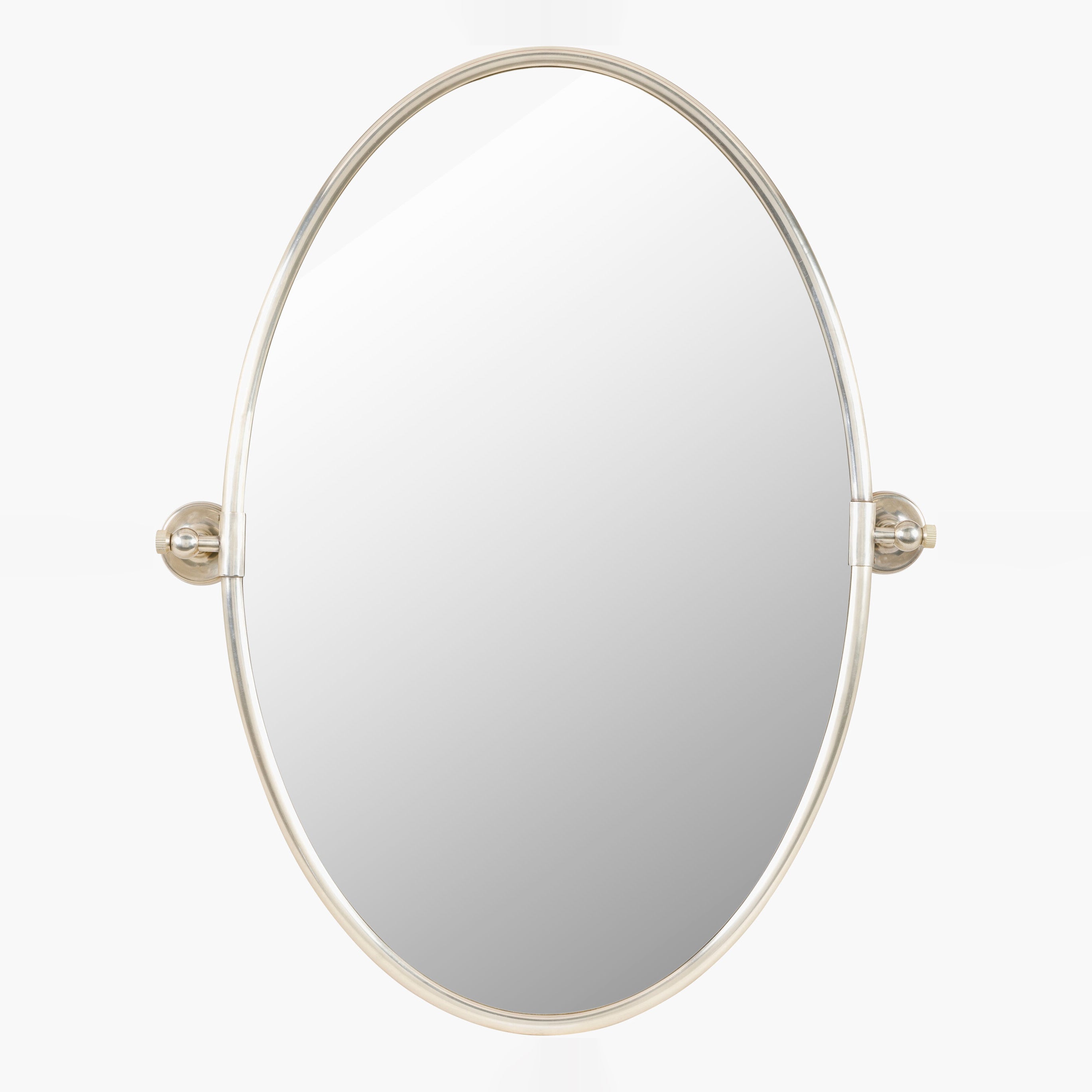 Oval Burnish Accent Mirror in Antiqued Silver on a white background at Addison West