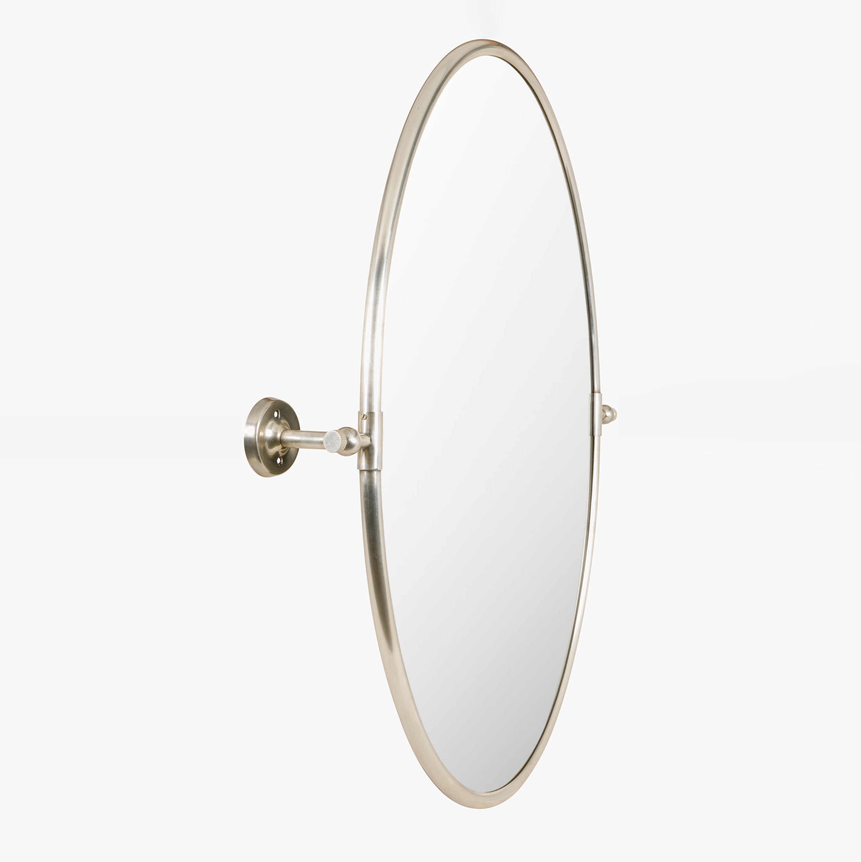 Oval Burnish Accent Mirror in Antiqued Silver on a white background at Addison West