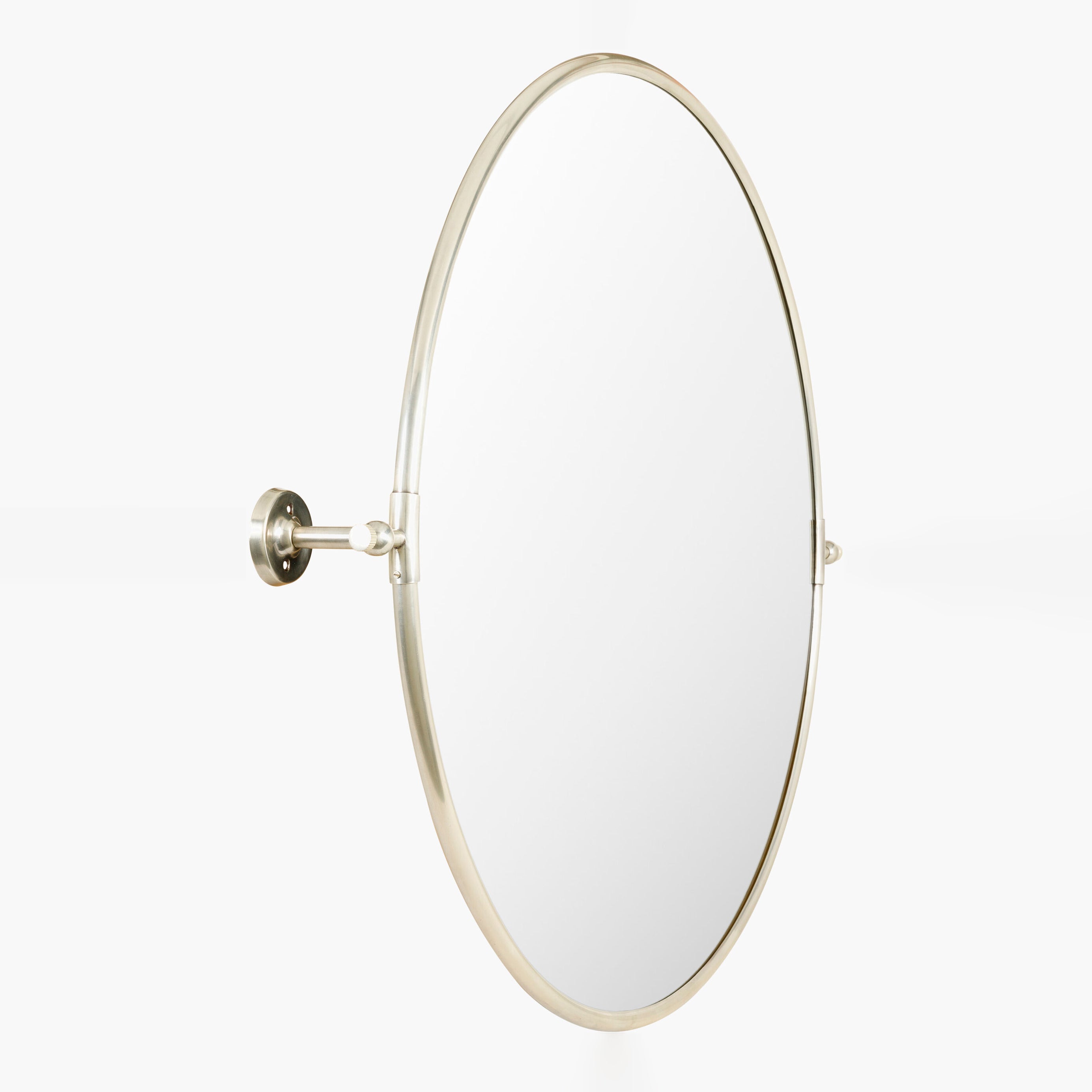 Burnish Round Accent Mirror in Antiqued Silver on a white background at Addison West