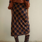 Plaid Midi Skirt on a white background at Addison West