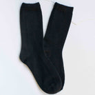 Bright Winter Wool Cashmere Socks in Black on a white background at Addison West
