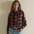 Lily Blouse in Navy on a white background at Addison West