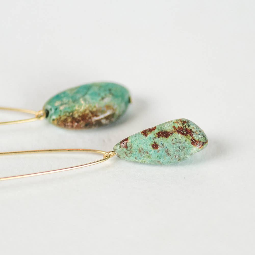 Commonform Aurora Earrings in Turquoise on white background at the Addison West.