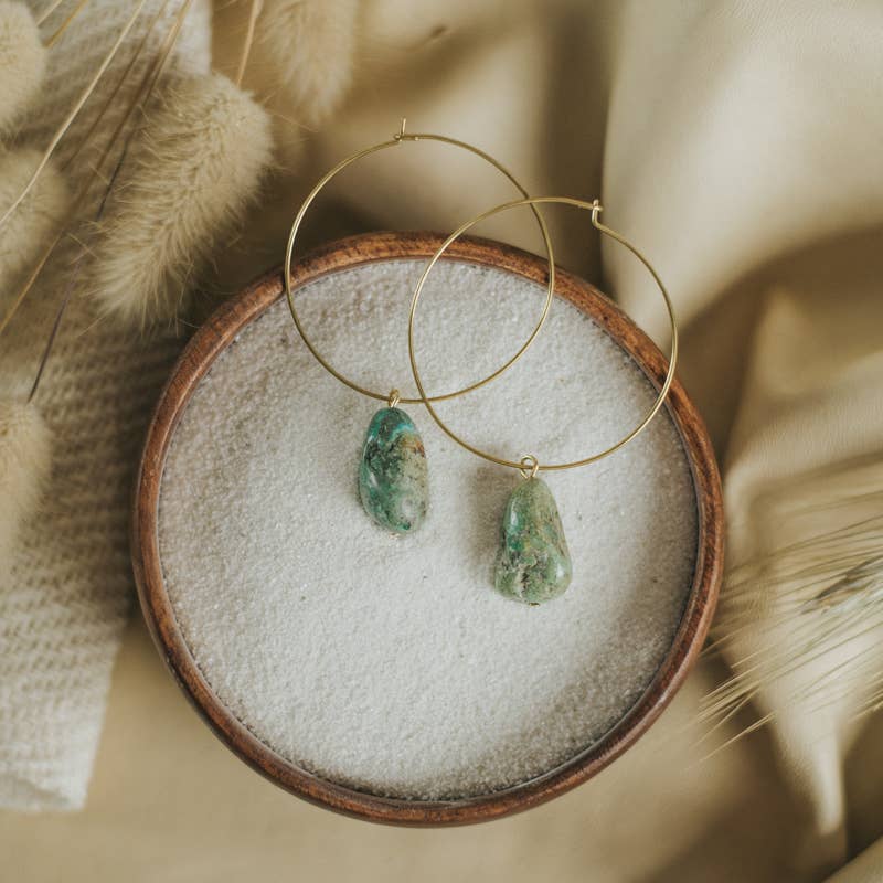 Commonform Aurora Hoops in Turquoise on textured background at the Addison West.
