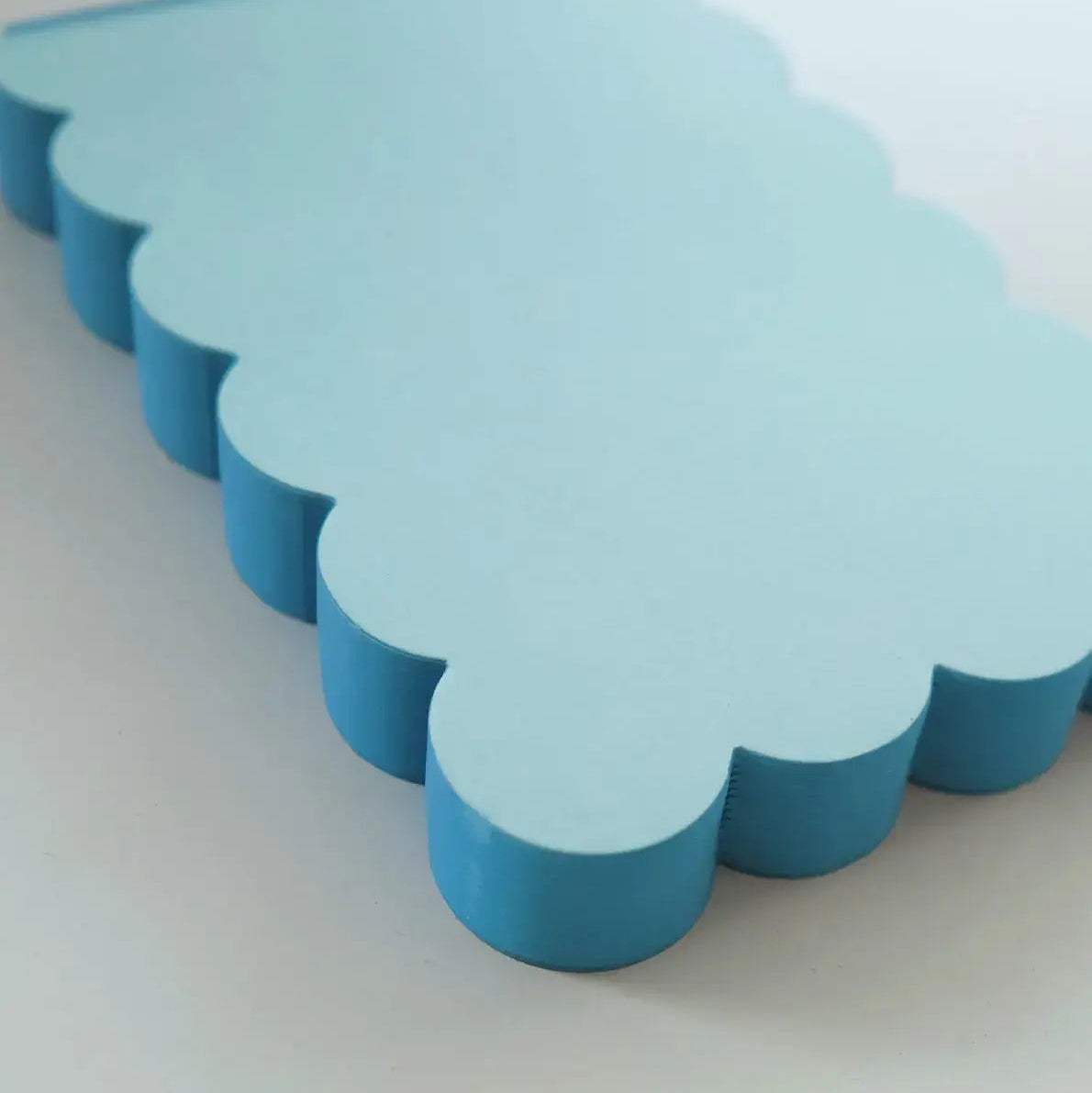 Scalloped Shaped Notepad in Aqua And Blue on a beige background at Addison West