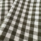 Olive Gingham Check Linen Tablecloth, 60" x 90" on a table at Addison West
