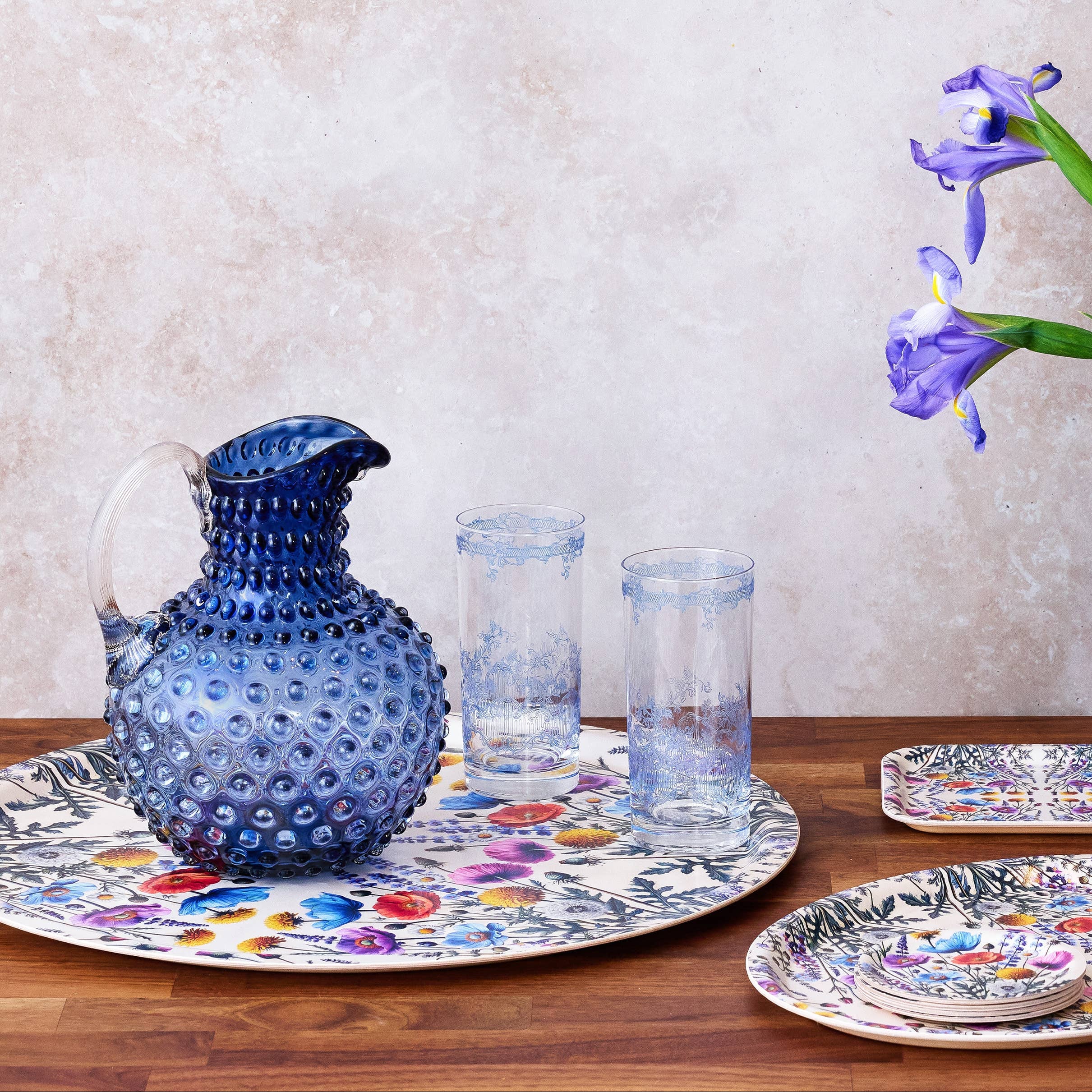 Hobnail Glass Pitcher in Atlantic Blue on a table at Addison West