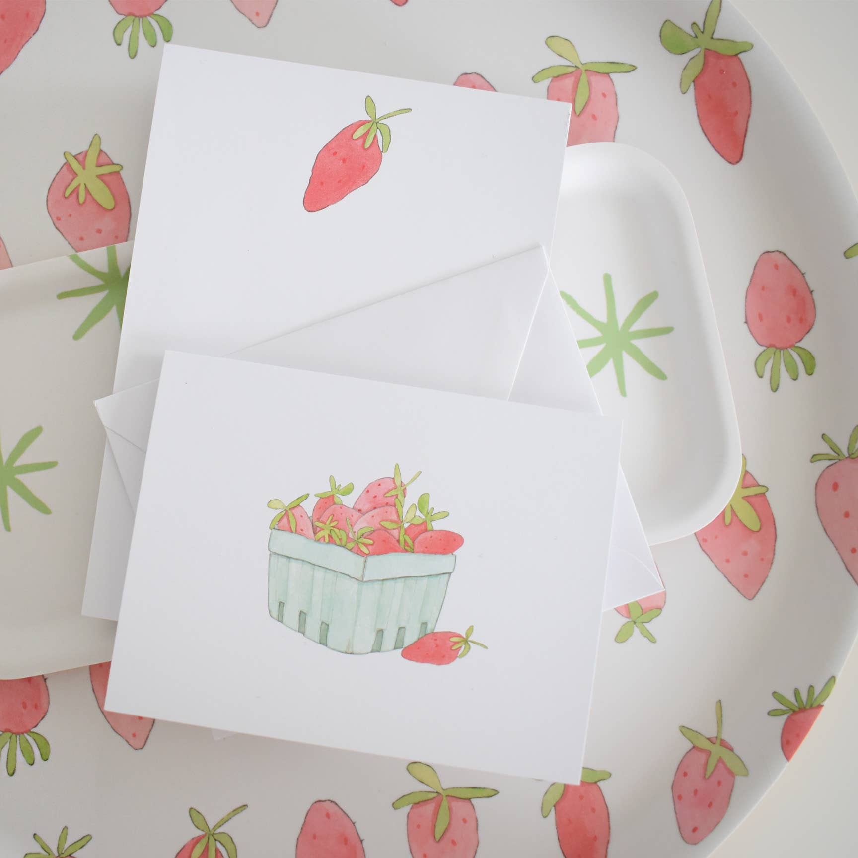 Strawberry Notepad on a table at Addison West