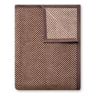ChappyWrap Harborview Herringbone Blanket in Chocolate on a white background at Addison West