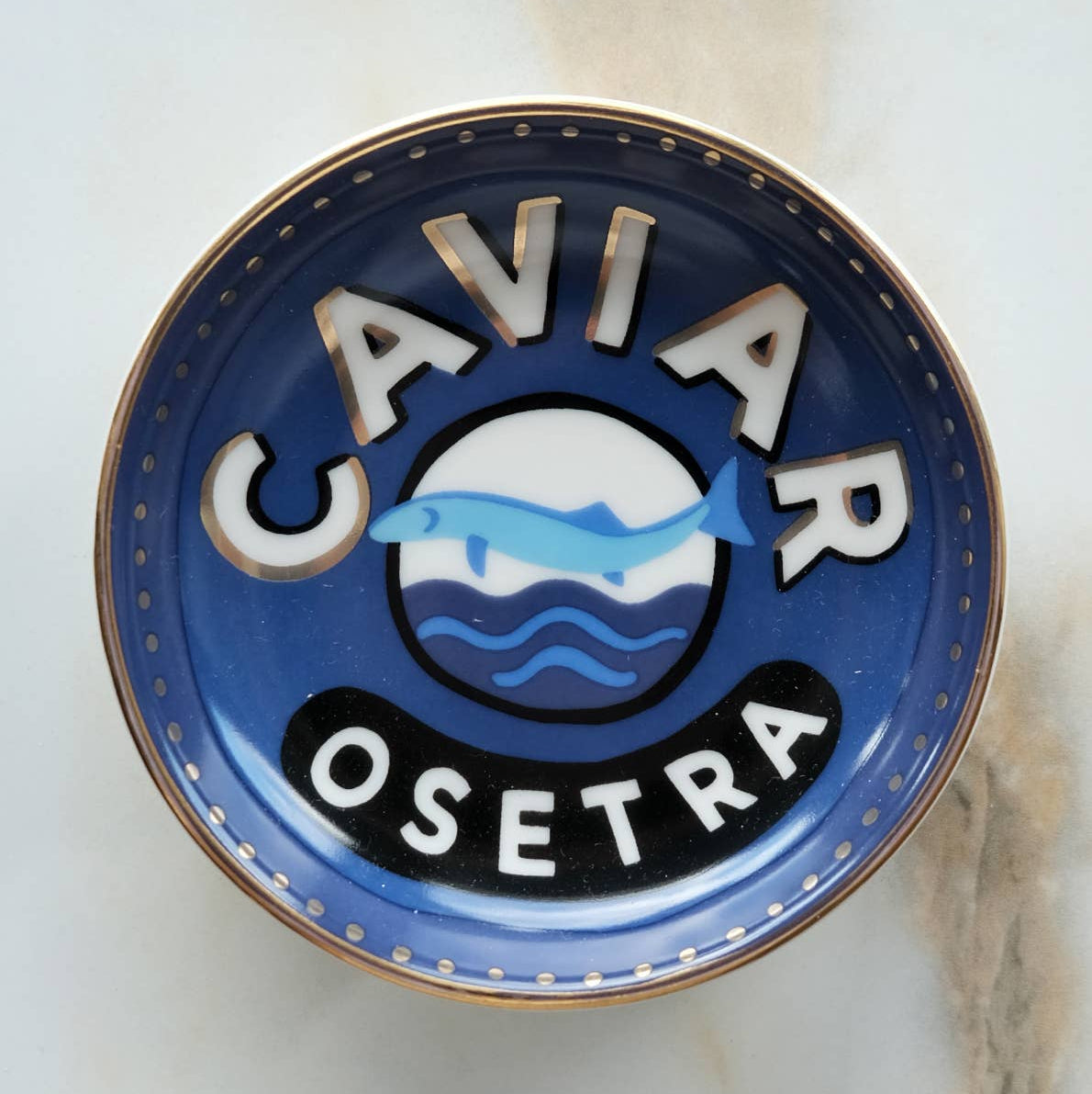 Caviar Trinket Dish on a beige background at Addison West