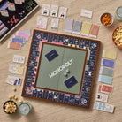Monopoly Grand Folding Edition on a table at Addison West